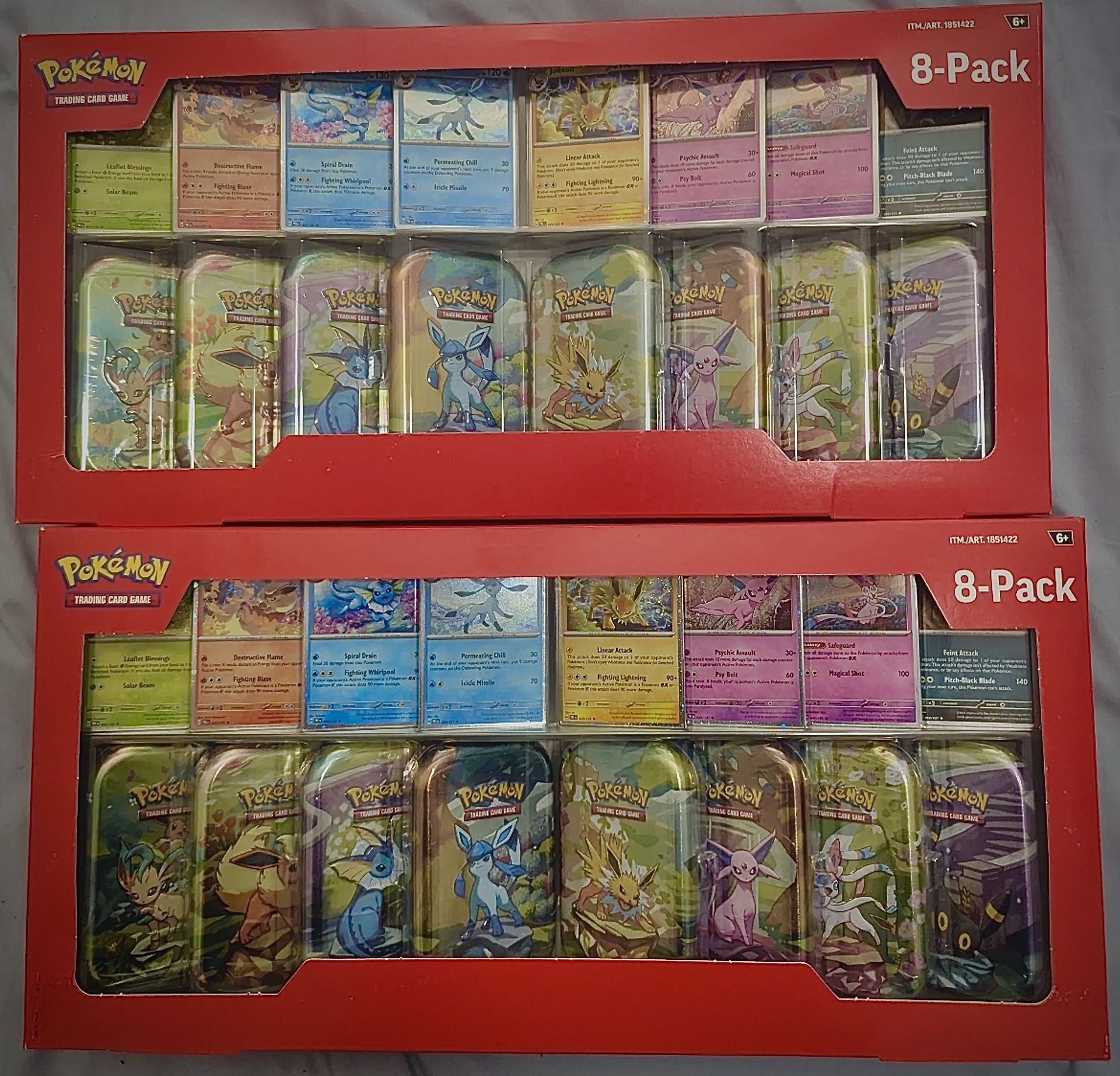 Pokemon Prismatic Evolutions Tins