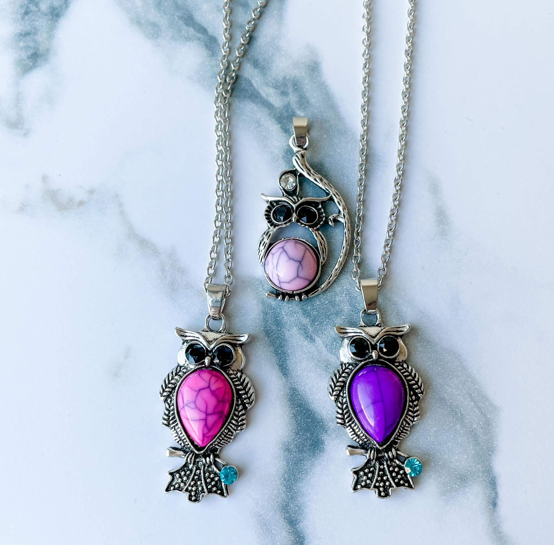 Purple and pink owl necklaces