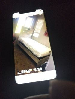 The twin size bed with the mattress