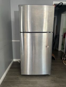 Stainless steel whirlpool refrigerator. 30in(W) x 66in(H)x 31 1/2in(D)