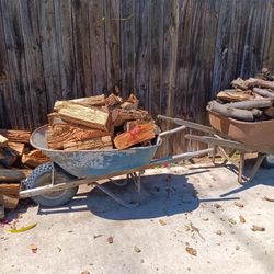 Firewood A Wheelbarrow Of Firewood For $25.00