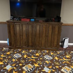 TV console with bifold doors