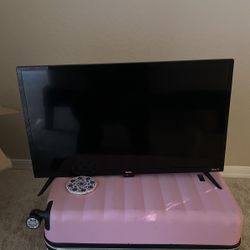 35 inch roku tv, new, comes with remote 