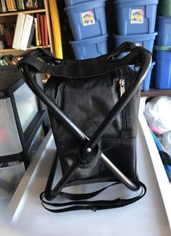 Cooler with a seat