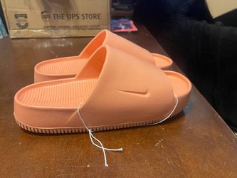 Pink Nike Calm Slides