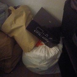 Bags of women's clothes and shoes