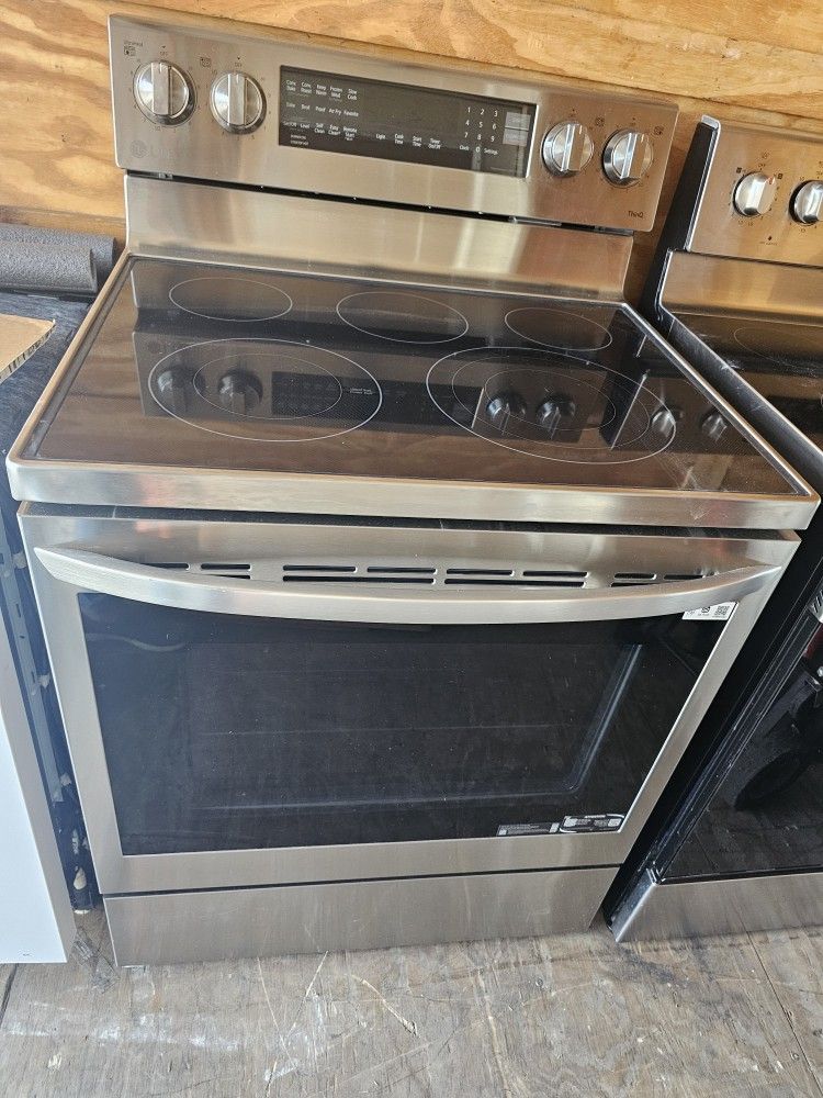LG STAINLESS STEEL GLASSTOP STOVE CONVECTION OVEN.....$ 400