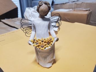 Angel with Daisy's Figurine