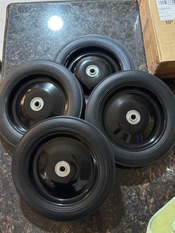 10x1.75" Flat Free Solid Rubber Tire and Wheel - 1/2" Axle Bore Hole $25 each I have 4