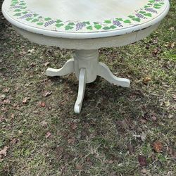 Antique table, vine designs  