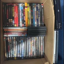 60 DVDs & DVD player with it (ONLY .45¢ PER DVD!!!) (60 DVD y reproductor de DVD con él)