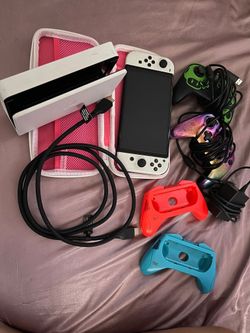 NINTENDO SWITCH PERFECT CONDITION WITH EXTRA CONTROLLERS (NEGOTIABLE)