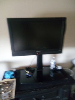 Dynex Flat Screen TV With A Stand