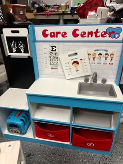 Toy kitchen and hospital
