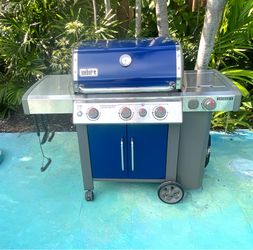 Weber Genesis II Gas Grill with Propane Tank and blue matching custom cover