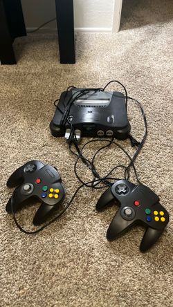 Vintage Nintendo 64 with game