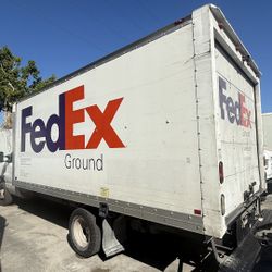 Two FedEx Trucks 