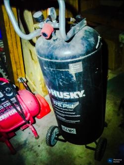 This is a Husky 20 Gallon Portable Vertical Electric Air Compressor