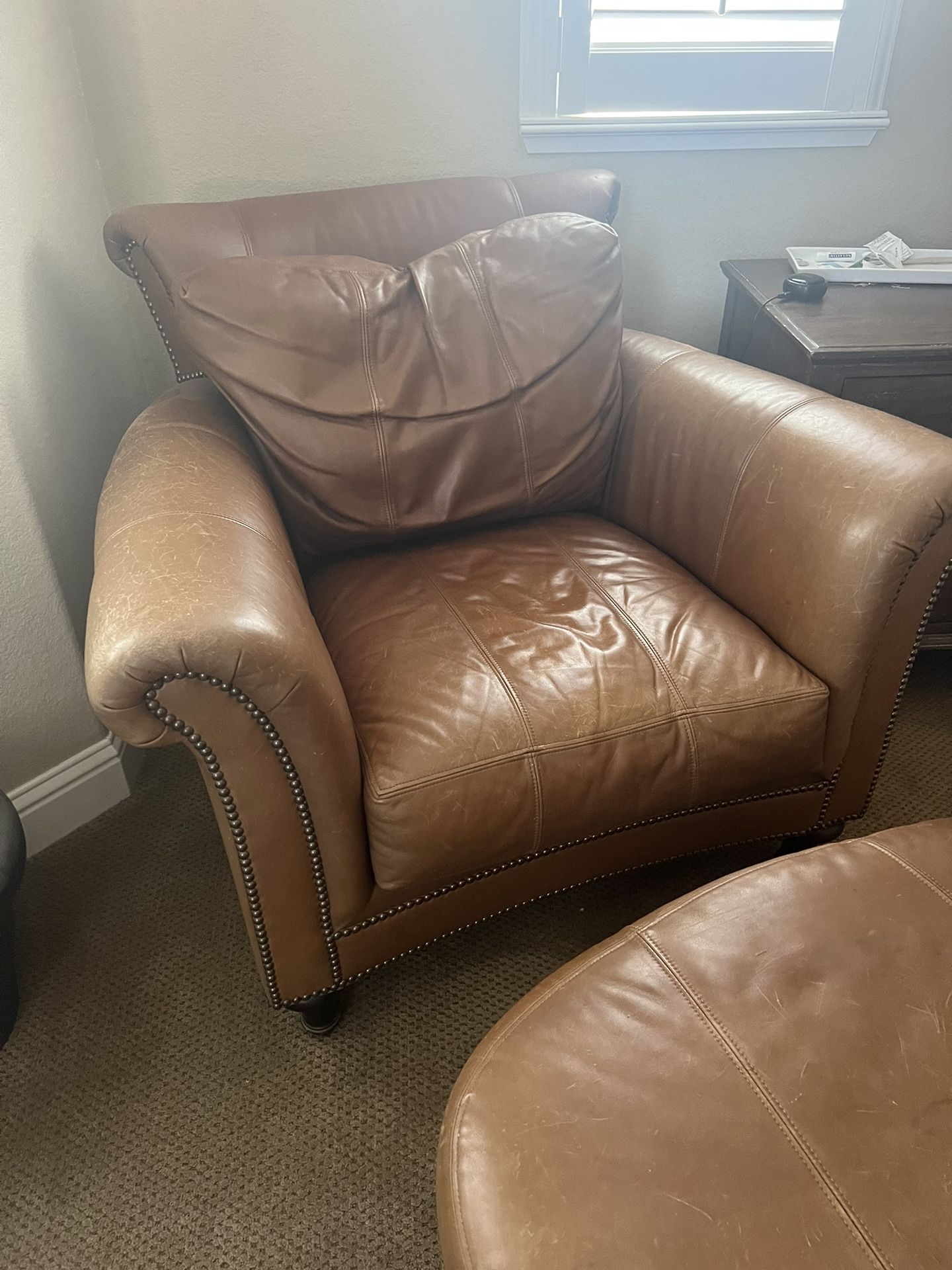 Ferguson Copeland leather chair and ottoman