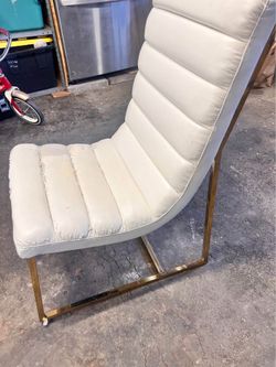 Beige and gold chair
