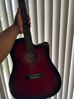 Acoustic guitar for adults.