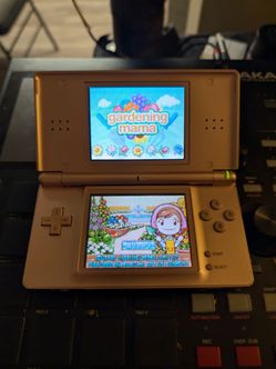 Rose gold Nintendo DS Lite console