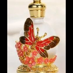 Vintage red and pink dragonfly perfume or essential oil bottle
15 ml
