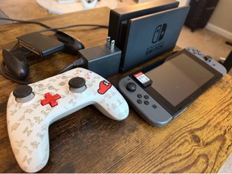 Nintendo Switch Bundle + Super Smash Bros. Ultimate + Extra Controller