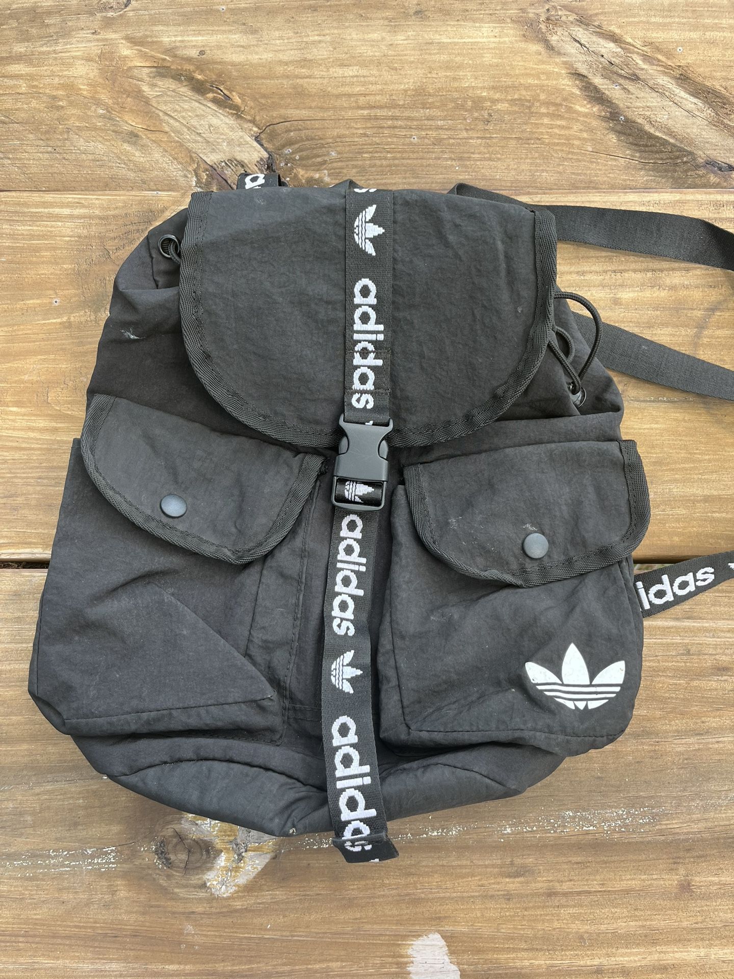 Black Adidas backpack with white accents