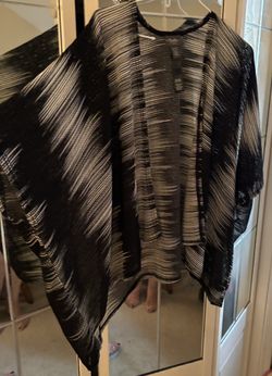 Sheer, black & silver wrap with wide arm slits