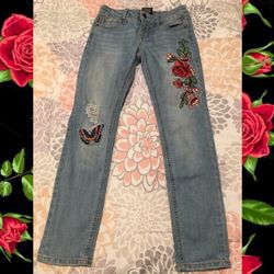 Girls distressed jeans with roses and butterfly