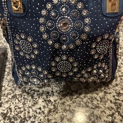Denim tote with crystal medallion accents