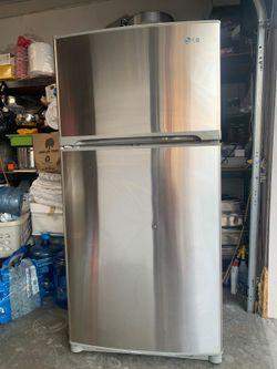 refrigerator, top and bottom. In good condition and clean,