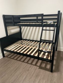 Twin/full bunk bed. Available in white & Espresso . Tax included . Free local delivery .  $350 for bunk bed only. $550 with mattresses.  Assembly requ