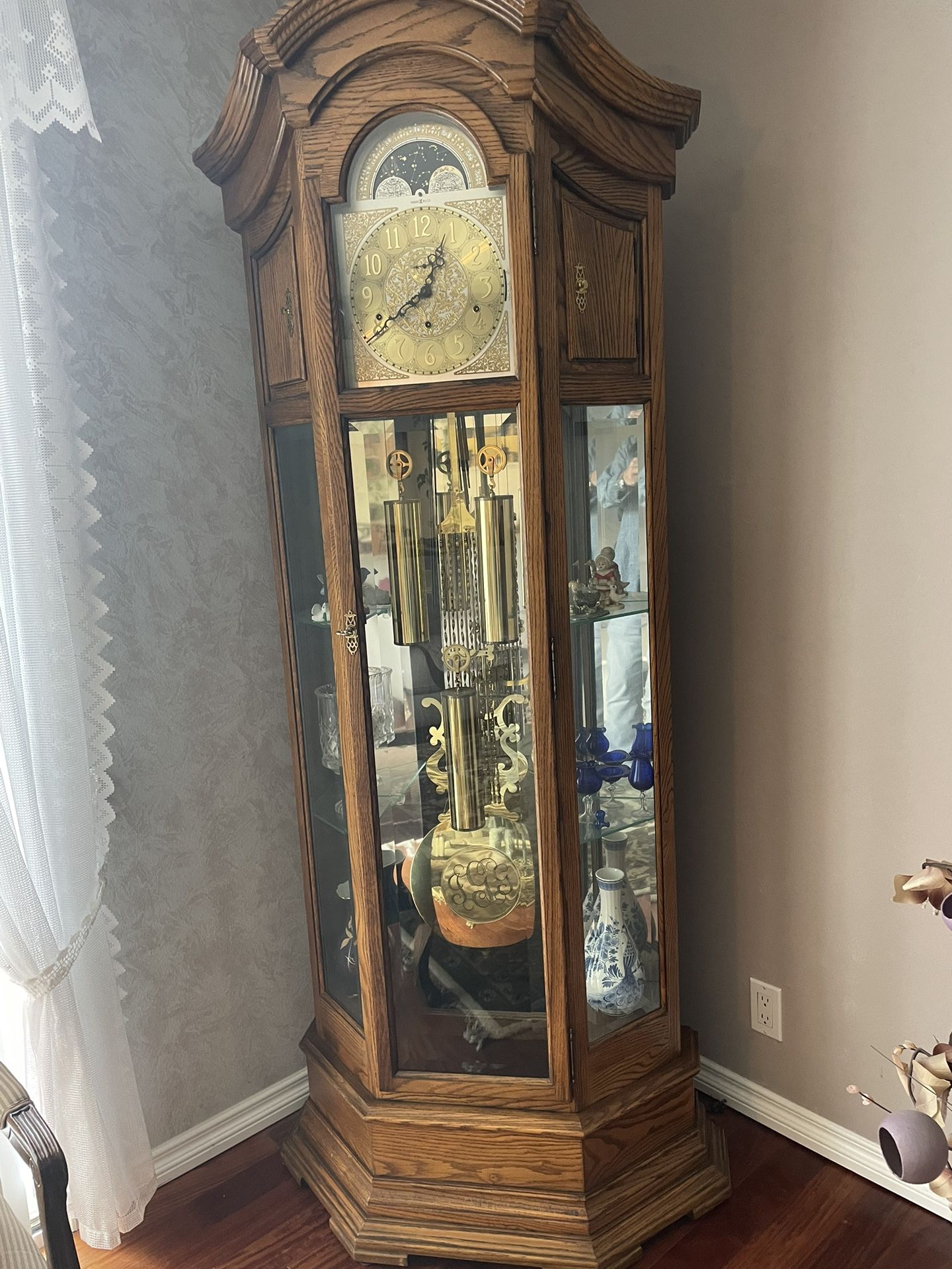Grandfather Clock By Howard Miller company 