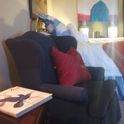 TWO NAVY WINGBACK CHAIRS