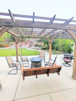 Golden Oak Solid Wood Swinging/ Hanging Bench Used condition as is Chains included