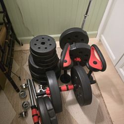 100 Lbs Of Weight Plates And Bars