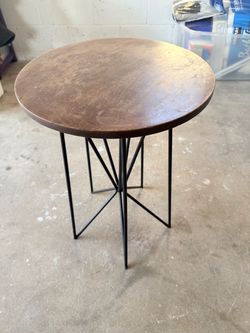 Side table used as a plant stand