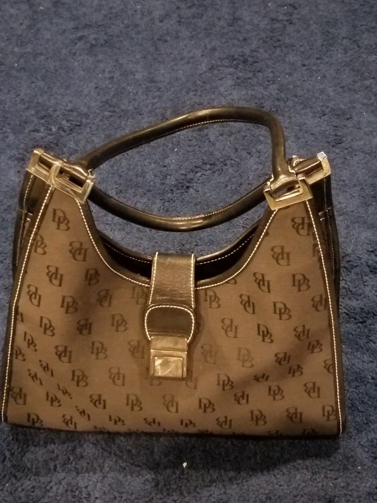 Dooney and Bourke purse and a matching wallet for Sale in Auburn, GA