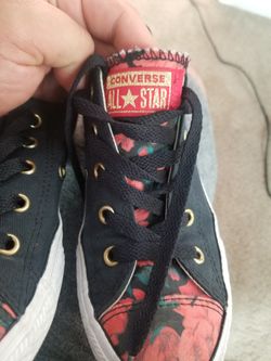 Converse. Black, floral, and gold.