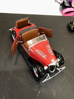 Vintage coca cola die cast table top Ford roadster model automobile with stand located in palm springs ca