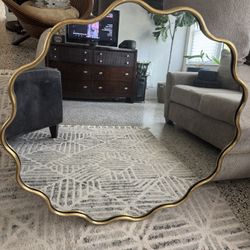 35 1/2” x 34” wavy gold mirror