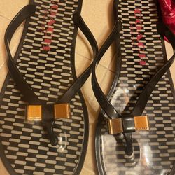 COACH New York Landon Jelly Flip Flop Sandals Black with Gold Bow Womens