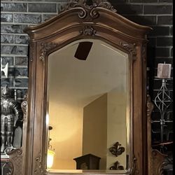 Antique Walnut mirror with carved ornate frame in Rococo Revival style