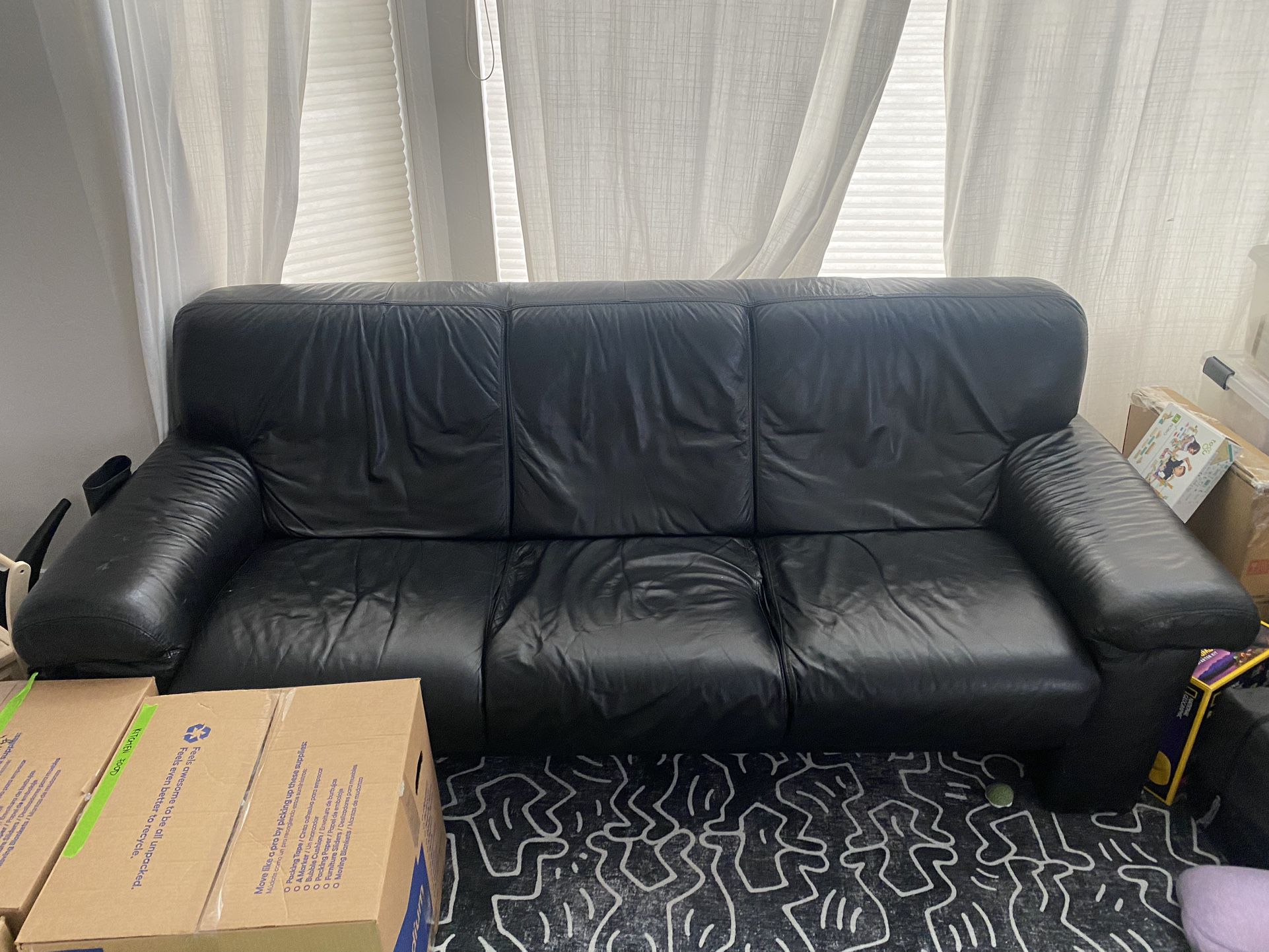 Vintage black leather sofa couch