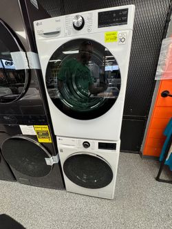 White LG Washer 2.4 cu ft and 4.2 cu ft Electric Dryer Set. Units are new open box scratch and dent
