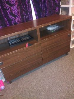 Brown cabinet 4 drawer tv stand i had my 55in tv on top of it
