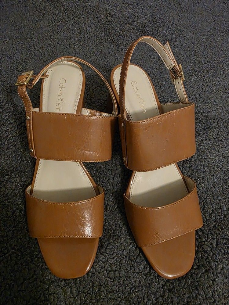 Brown leather heels 8.5