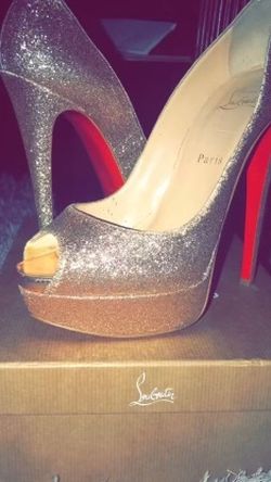 Christian Louboutin Gold Glitter Pumps